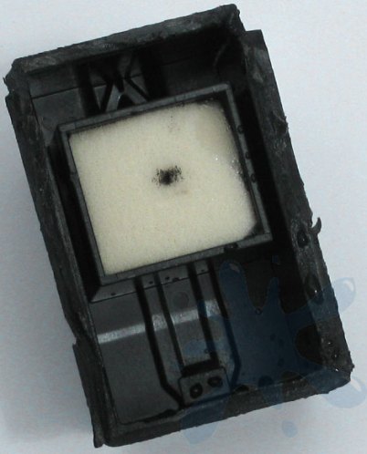HP 60 black ink cartridge standard capacity  - or half full ink cart - cover removed to reveal inside the cartridge.
