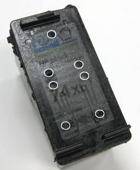 Refill holes for the HP 74XL black inkjet print cartridge.